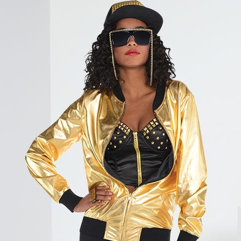 Woman in gold rapper costume
