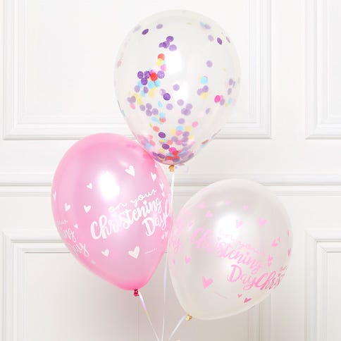 A bouquet of three Christening balloons